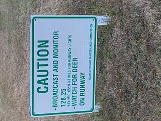 Deer caution sign near Blakely runway
